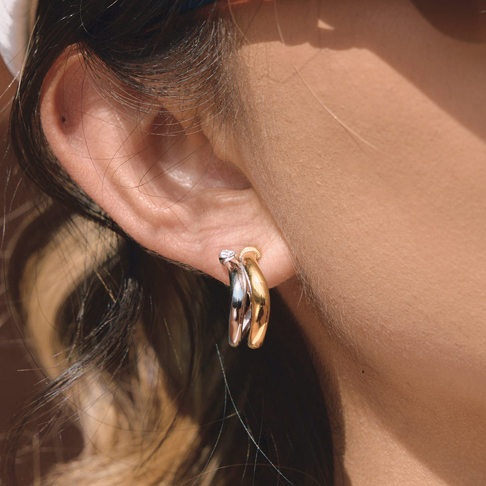 The Sway Hoops worn on ear